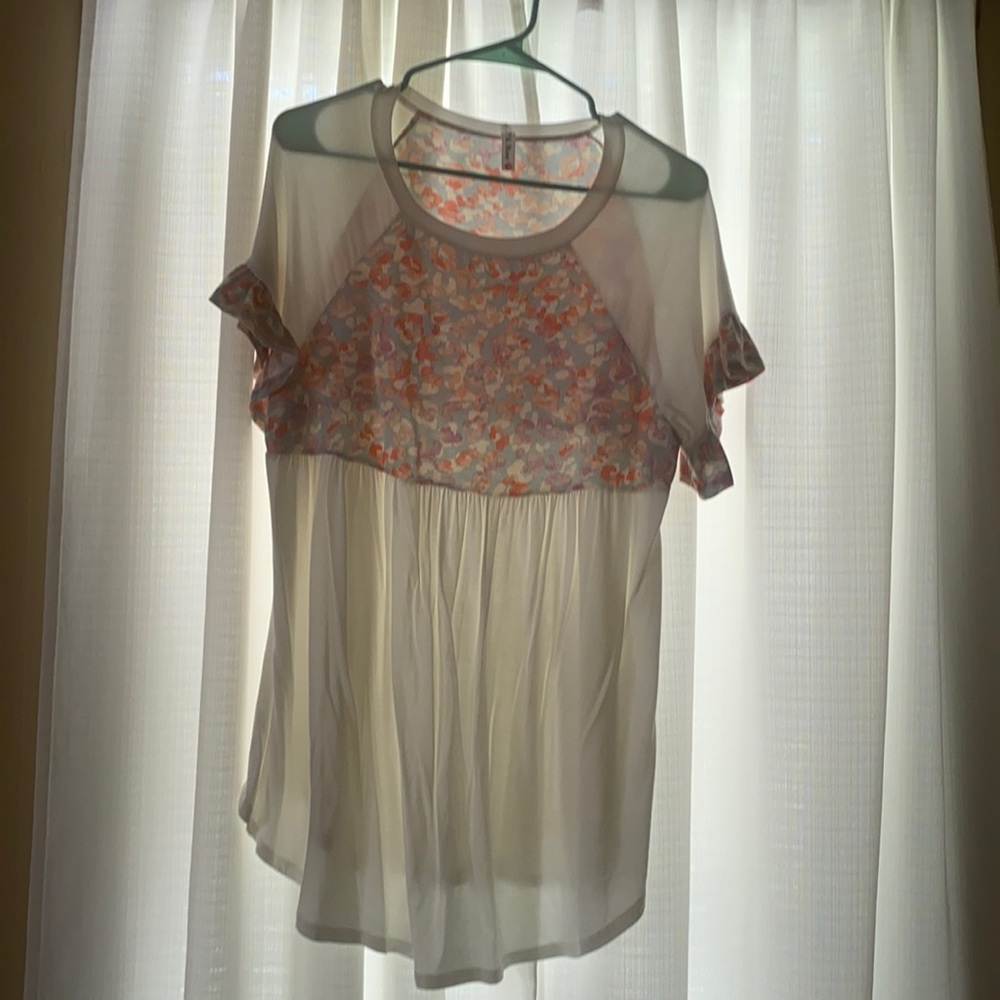 Never worn. Perfect condition.